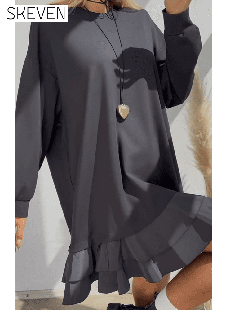 Locker geschnittenes, einfarbiges Kleid mit Patchwork