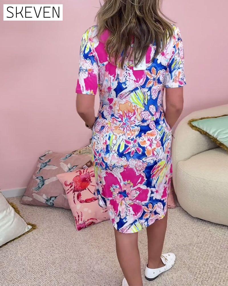 Stilvolles Kurzarmkleid mit Blumenmuster und Taschen