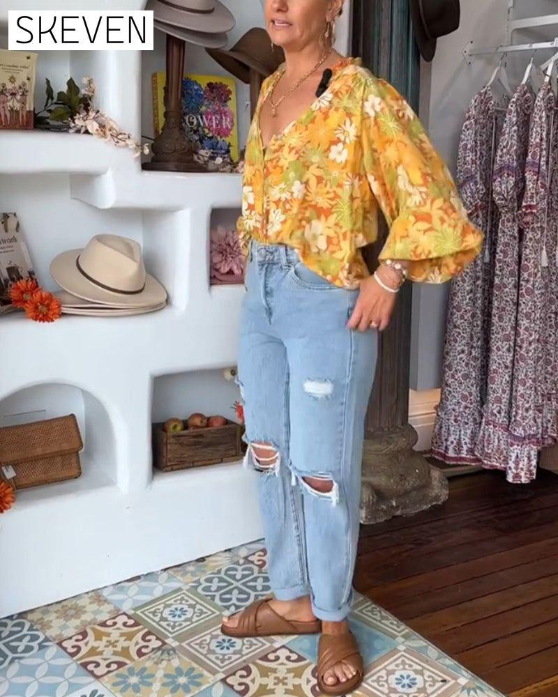 Bluse mit V-Ausschnitt und Blumenmuster