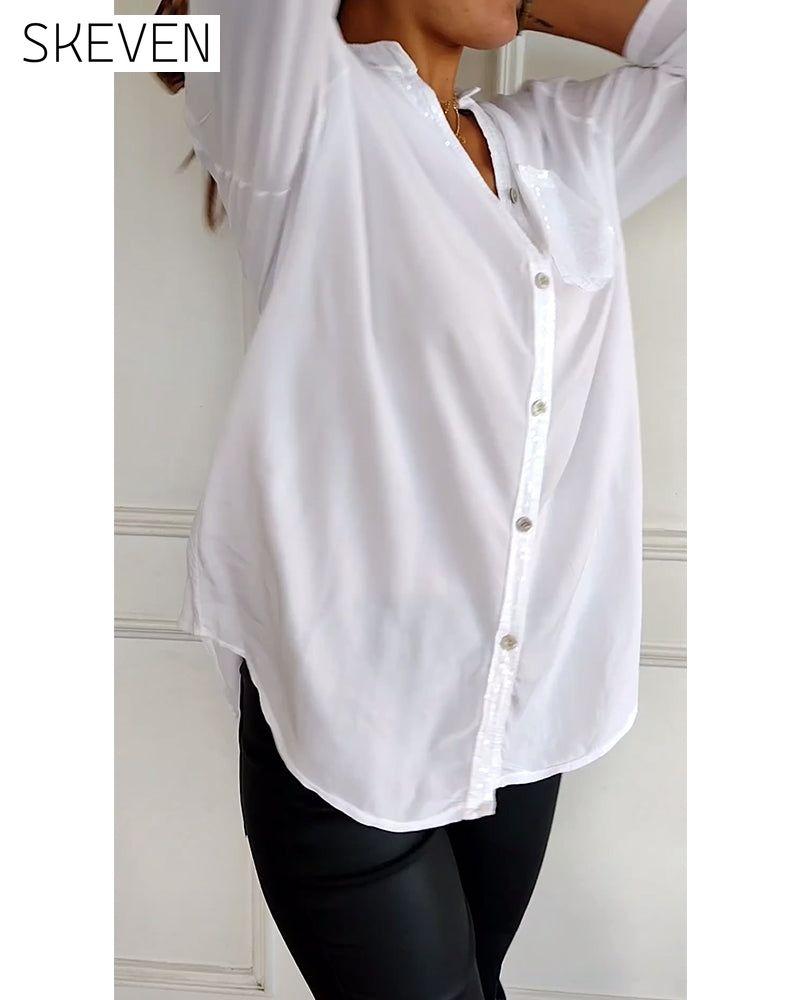 Paneled sequin button casual top