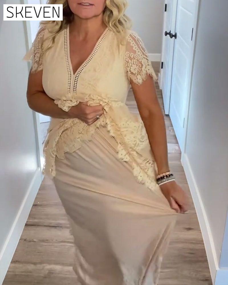 Elegantes Kleid mit V-Ausschnitt und Spitze an der Taille