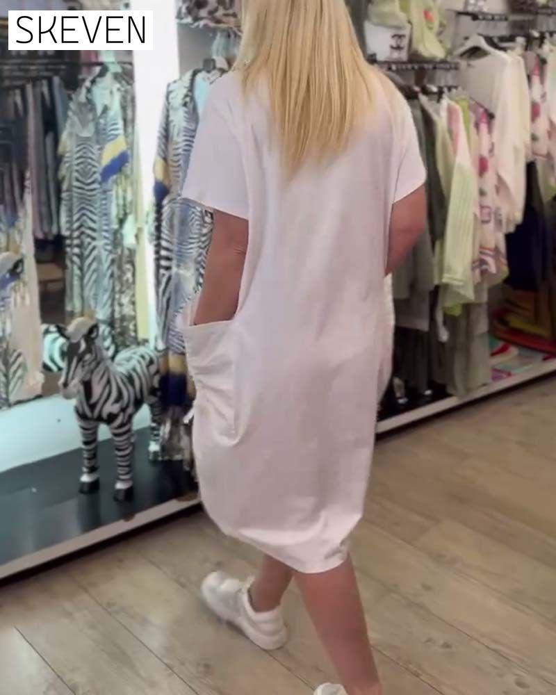 Locker geschnittenes Kleid mit kurzen Ärmeln, bedruckt, große Tasche