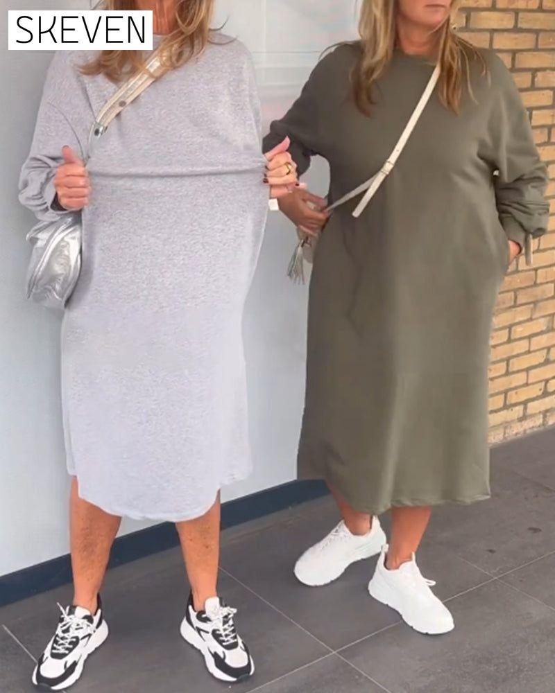 Schlichtes Kleid mit Rundhalsausschnitt und Tasche