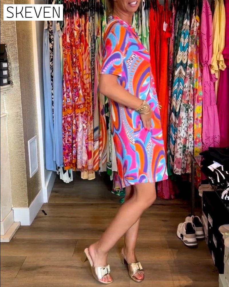 Robe à poches imprimées colorées et col en V
