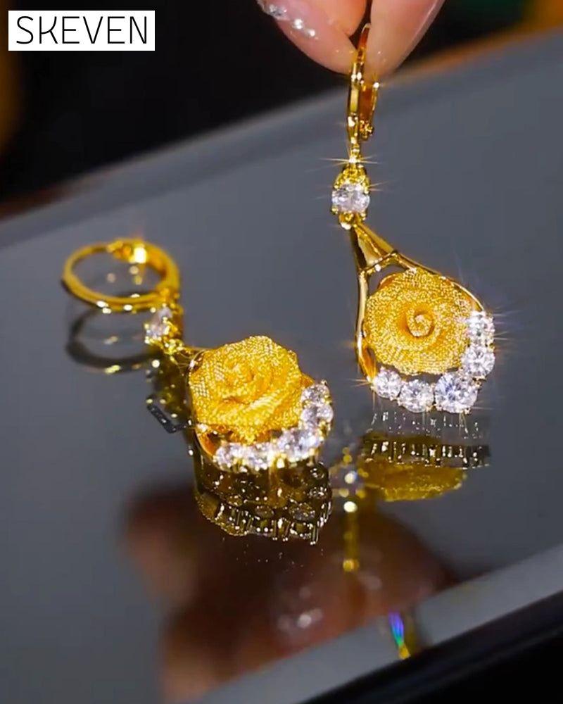 Elegante Netzohrringe mit Rosenmotiv