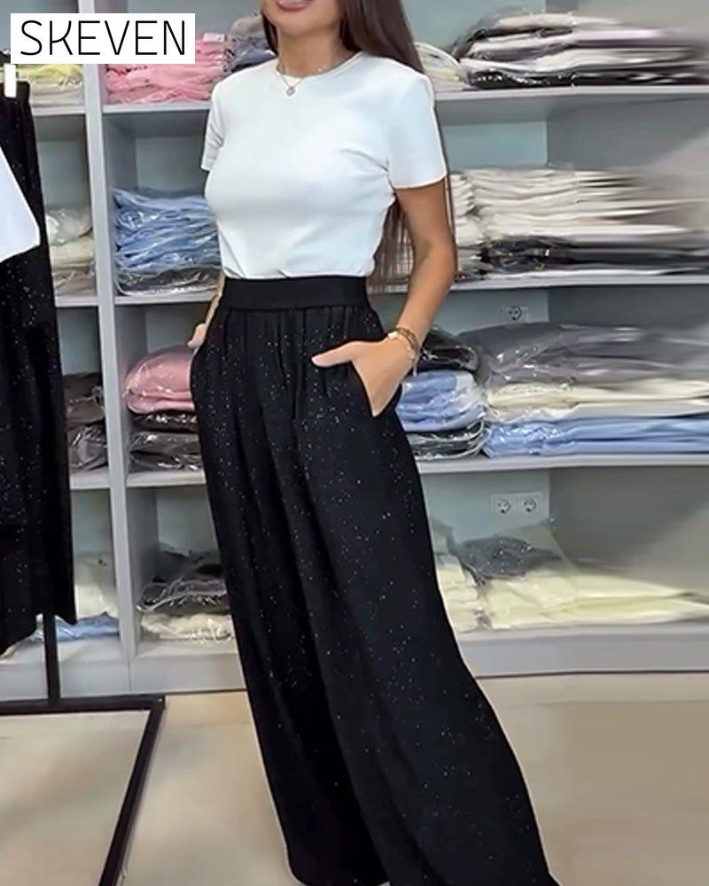 Pantalon élégant à taille haute et jambes larges et brillants