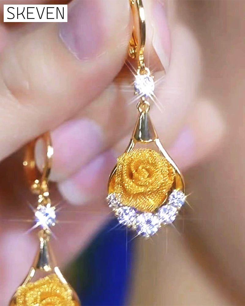 Elegante Netzohrringe mit Rosenmotiv