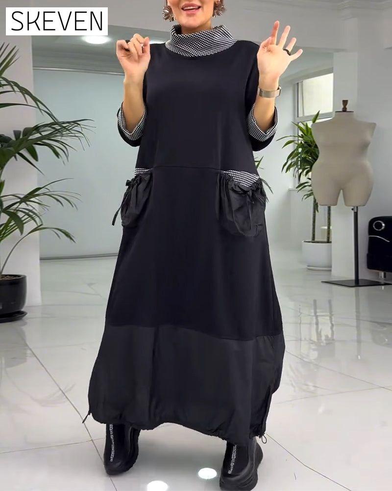 Lässiges Kleid mit Karomuster, hohem Kragen und Taschen