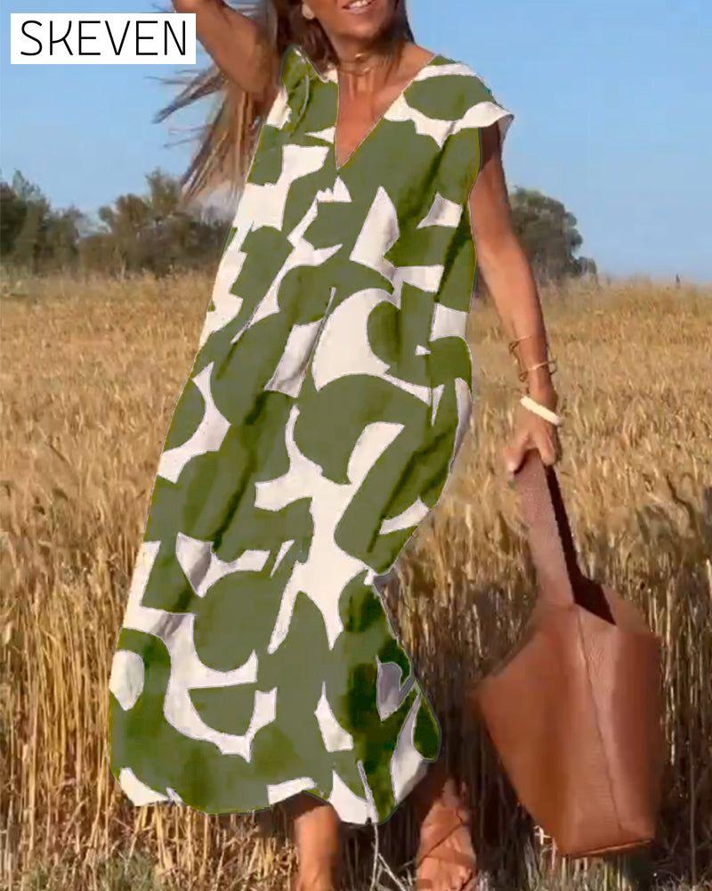 bedrucktes Kleid mit V-Ausschnitt