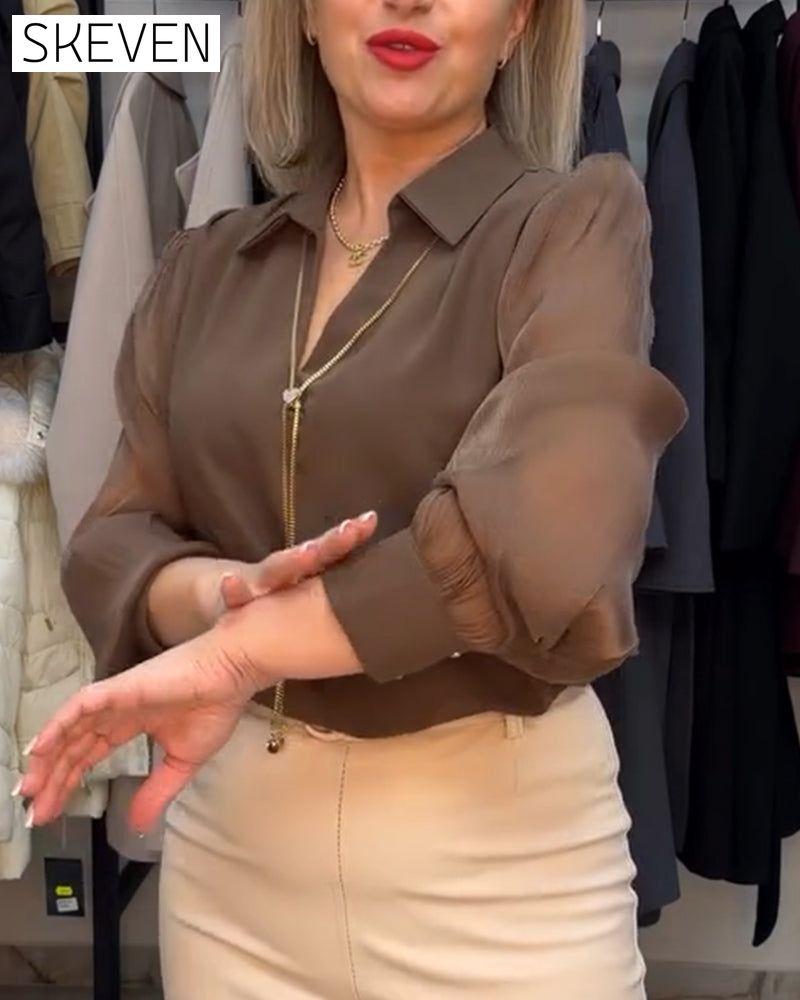Elegante, transparente Bluse mit Kragen und Puffärmeln