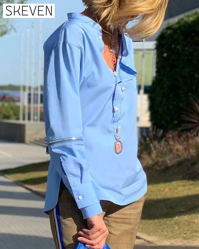 Buttoned solid color irregular top