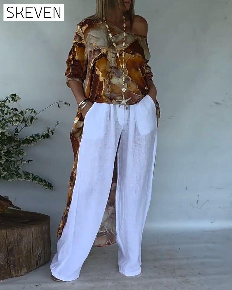 Modische Bluse mit Schlitz und Print