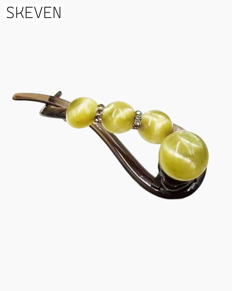 Elegante Haarspange für nach hinten gekämmte Frisuren