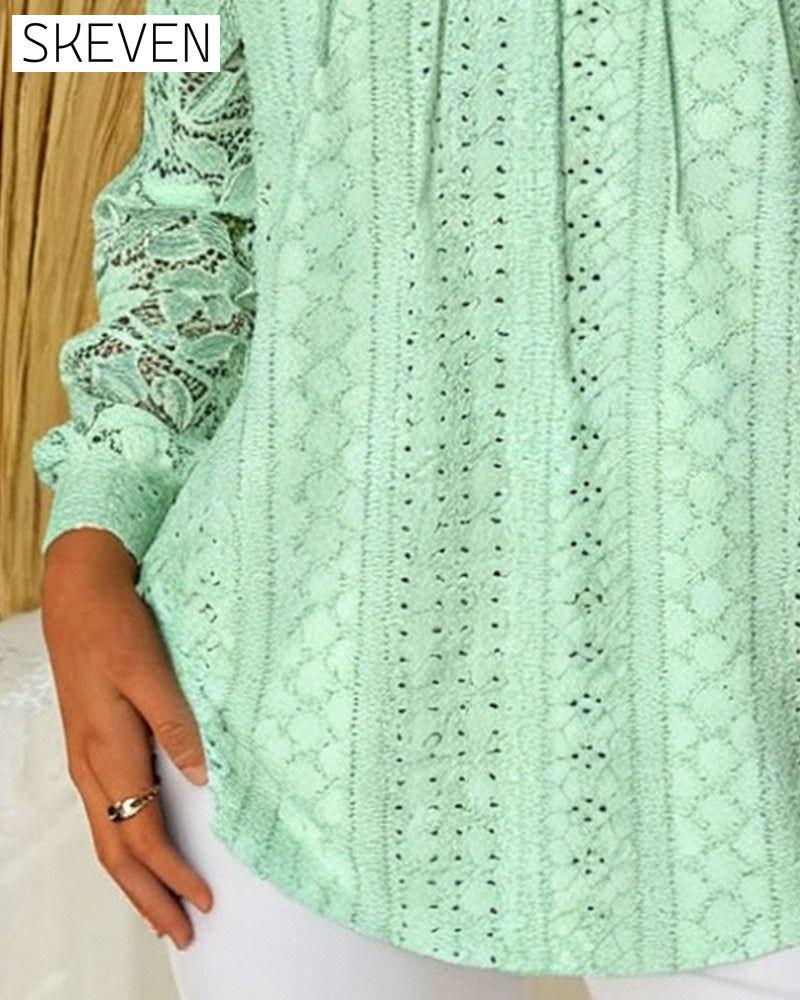 Blouse élégante unie à découpes