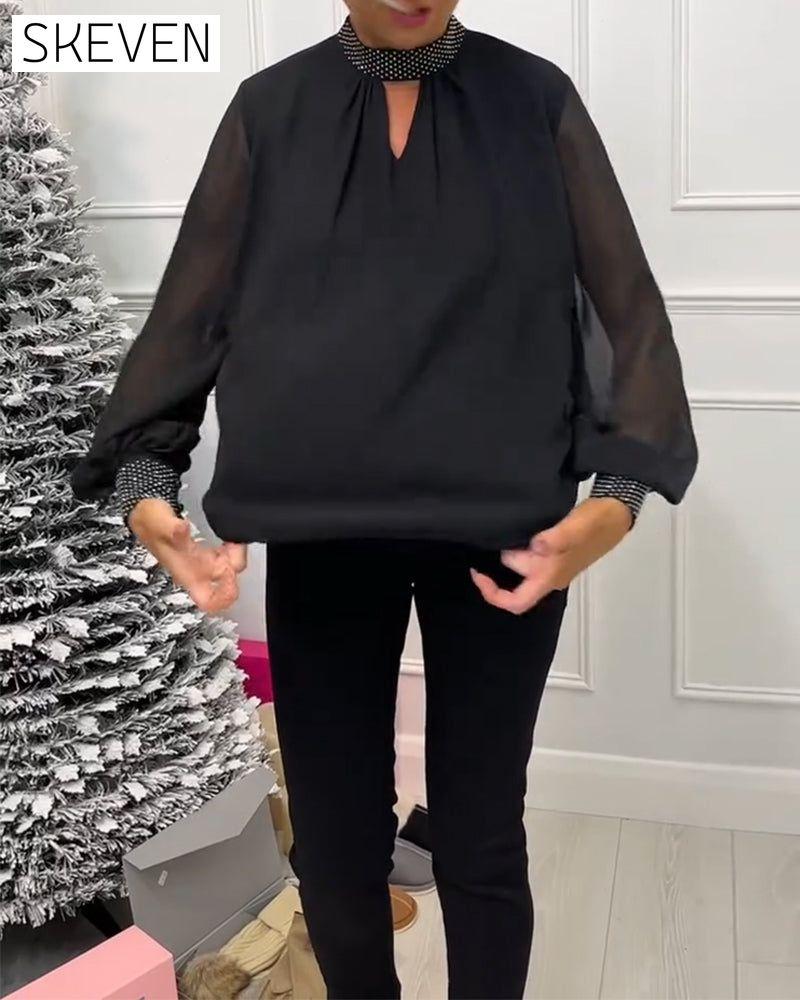 Blouse unie tendance à col montant patchwork ajouré