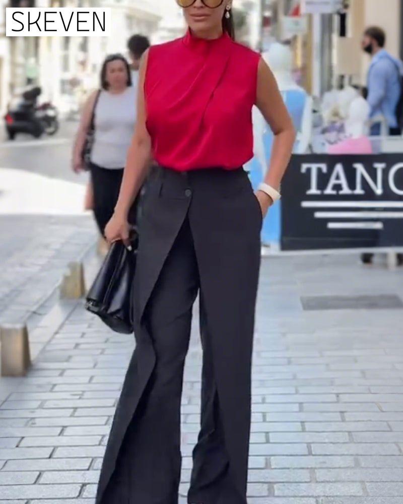 Pantalon asymétrique à jambes larges et superposées