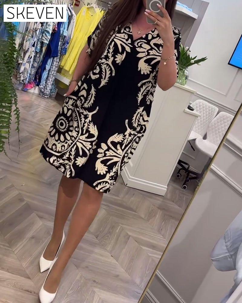 Robe ample rétro imprimée à col en V et manches courtes