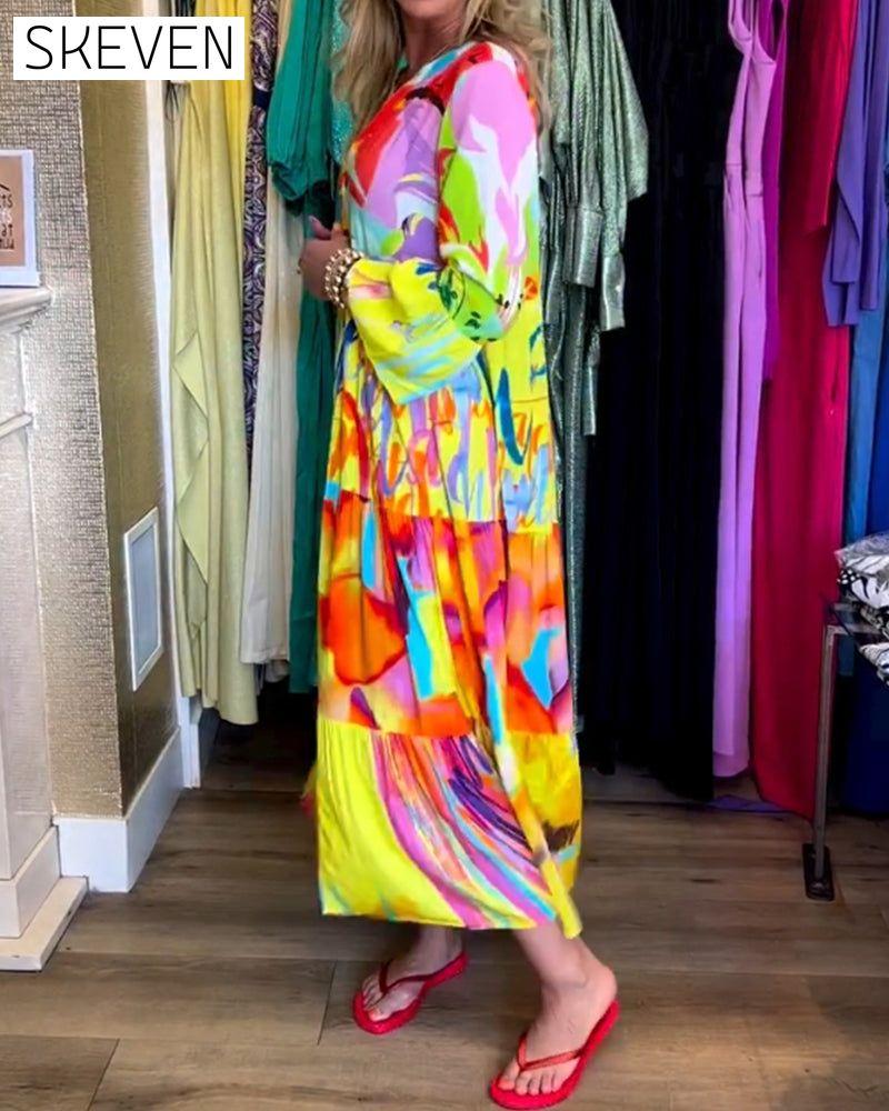 Bedrucktes Kleid mit ausgestellten Ärmeln