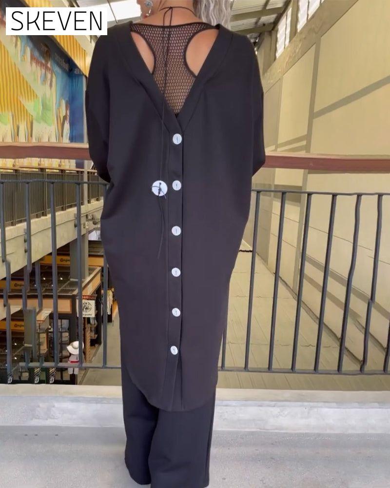 Loose-fitting long-sleeved top
