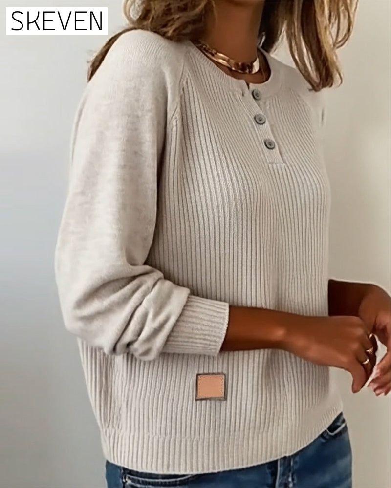 Stilvoller Pullover mit Raglanärmeln und Knopfleiste