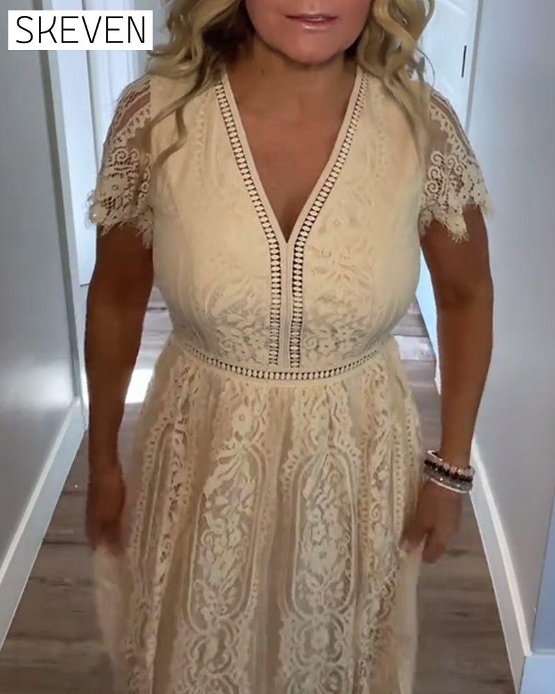 Elegantes Kleid mit V-Ausschnitt und Spitze an der Taille