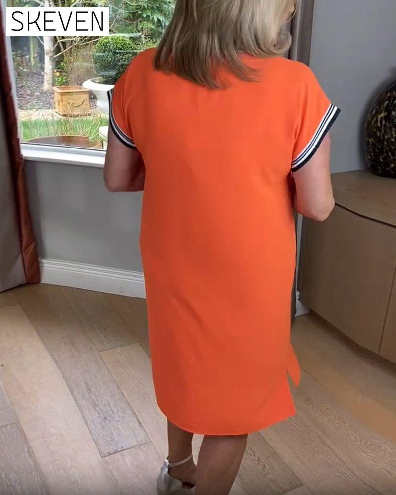 Sportkleid mit halbem Reißverschluss und Kontrastfarbe