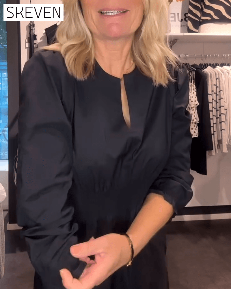 Robe trapèze à manches bouffantes et taille haute