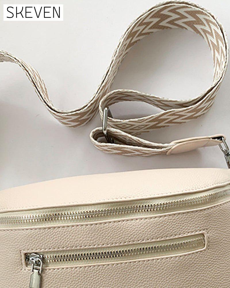 Zippered shoulder bag with contrast straps