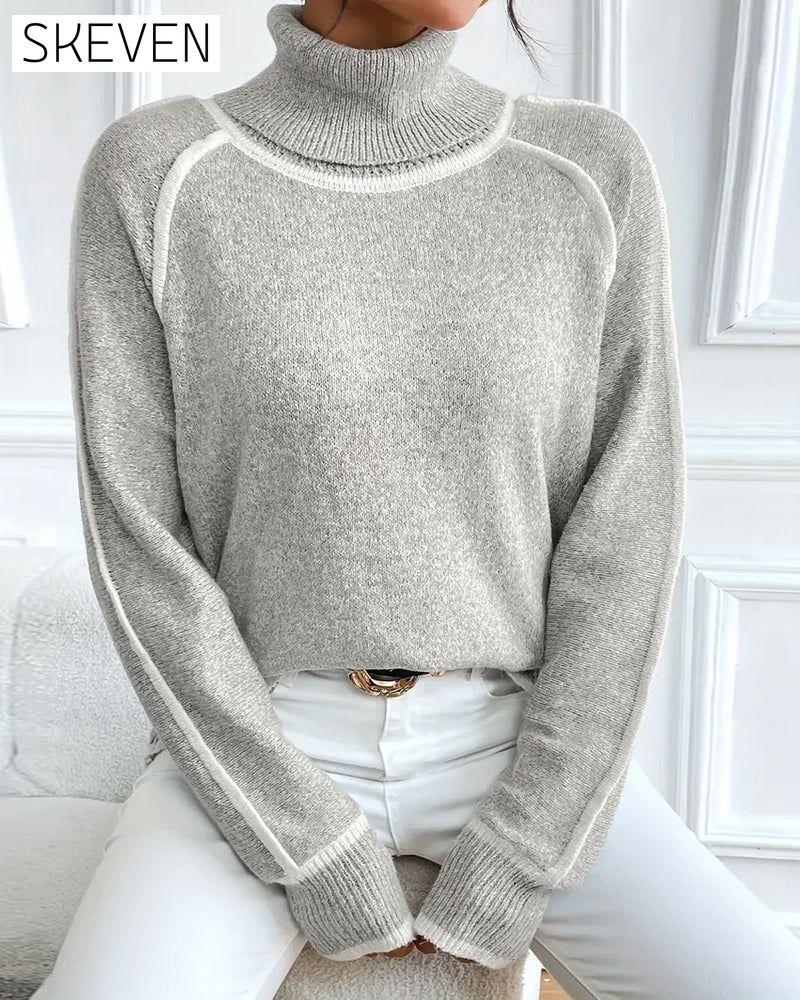 Pull à col roulé tendance à couleurs contrastées