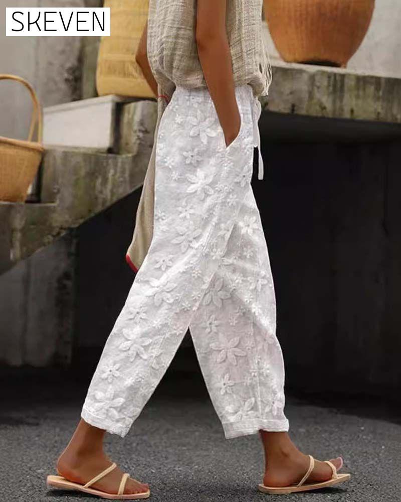Floral embroidered lace-up solid color casual pants