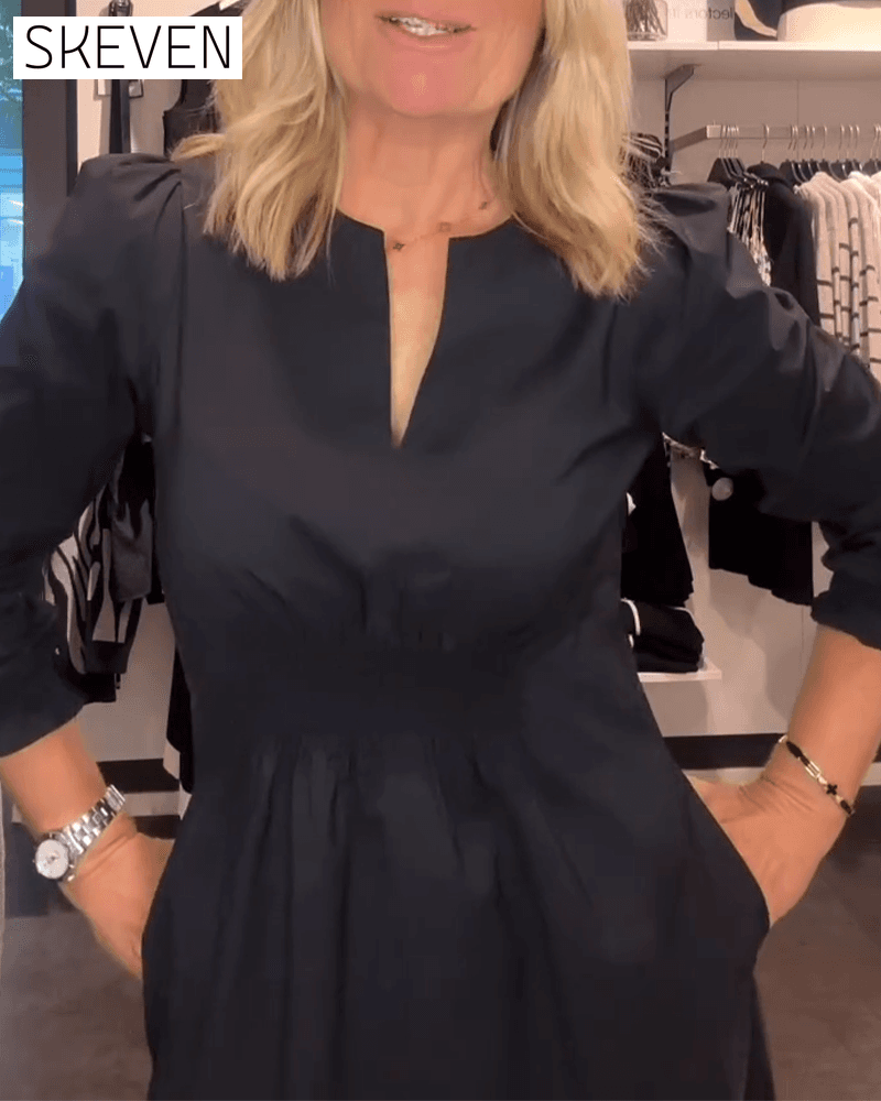 Robe trapèze à manches bouffantes et taille haute