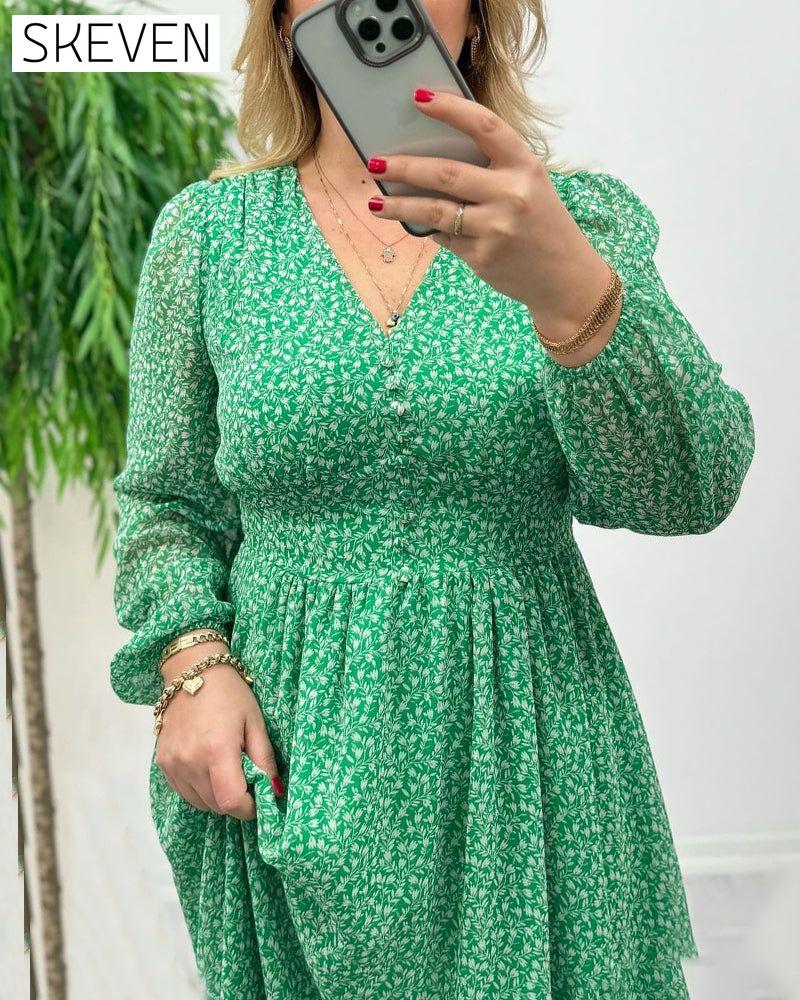 Elegantes Kleid mit Print und Knöpfen