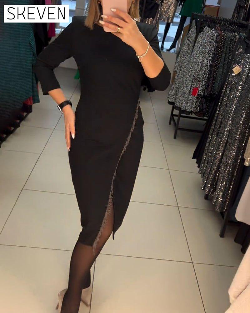 Robe à col rond et fente oblique