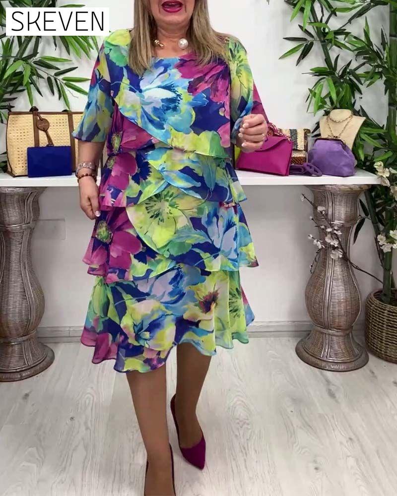 Kleid mit Blumenmuster, Rundhalsausschnitt und Rüschen an den halben Ärmeln