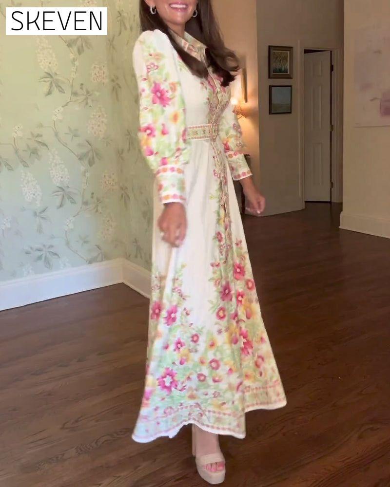 Elegantes Maxikleid mit floralem Muster, Reverskragen und langen Ärmeln