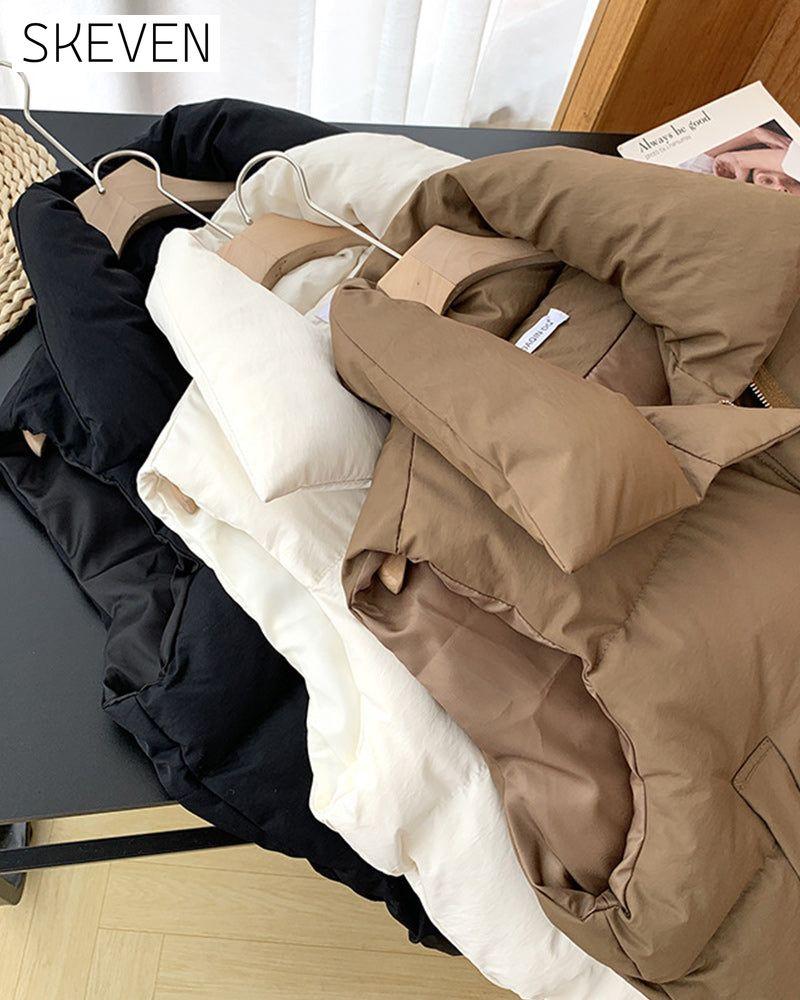 Einfache, einfarbige, ärmellose Steppjacke mit Reißverschlusstasche
