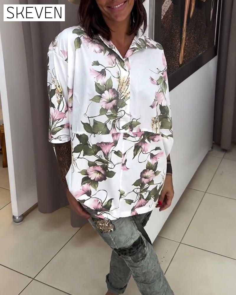 Elegante Bluse mit Revers und Blumenmuster