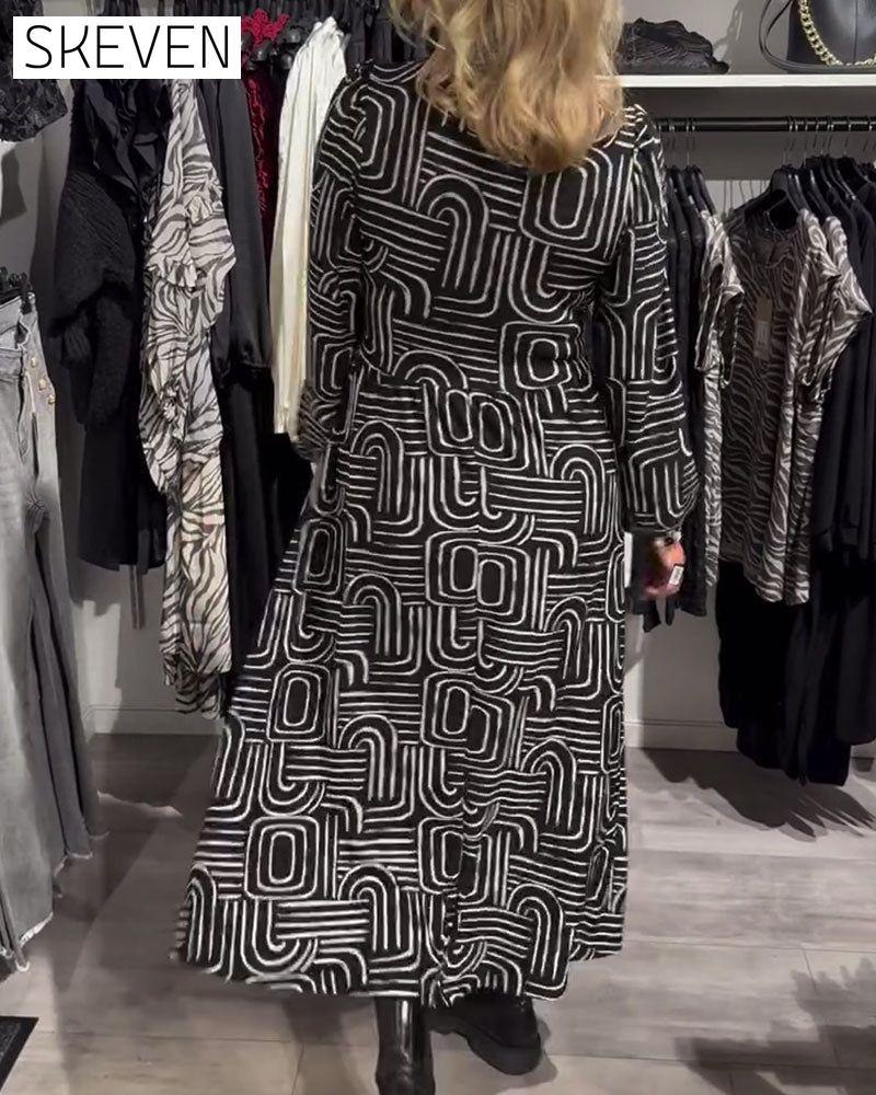 Modisches, bedrucktes Kleid mit Reverskragen