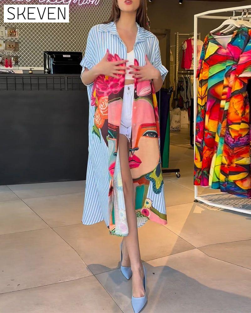 Bluse mit vertikalen Streifen und Charakterprint, Reversschlitz
