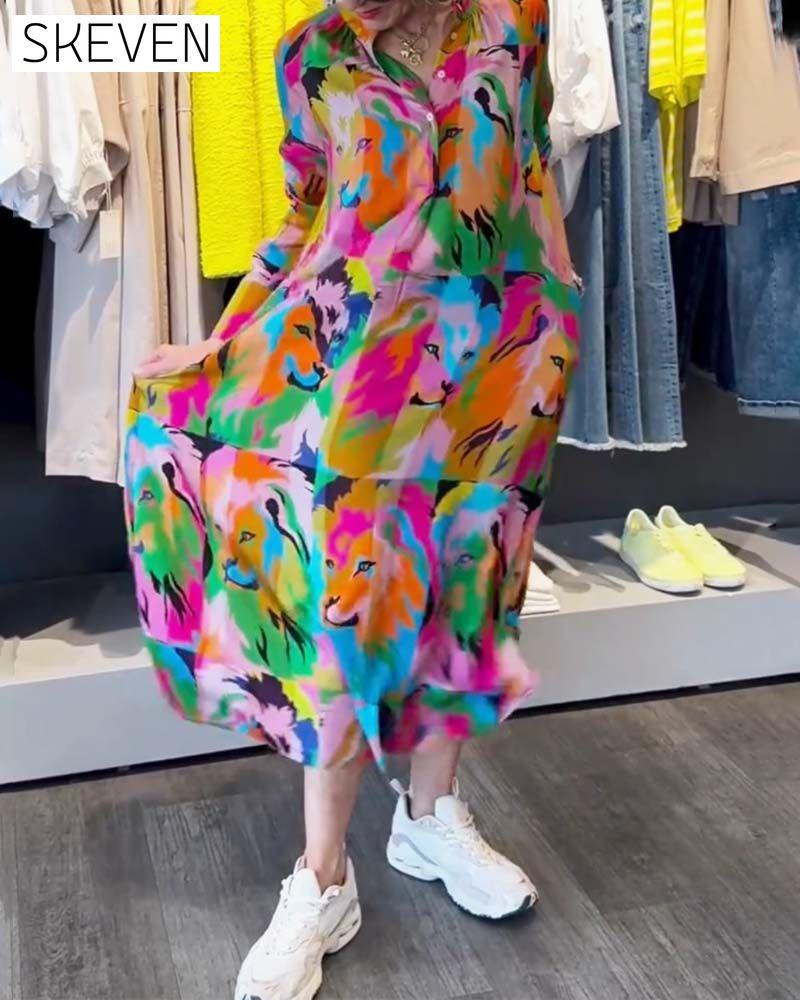 Kleid mit farbigem Aufdruck und Taschen