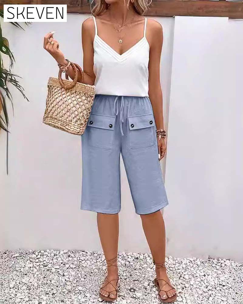 Casual solid color pocket half length trousers