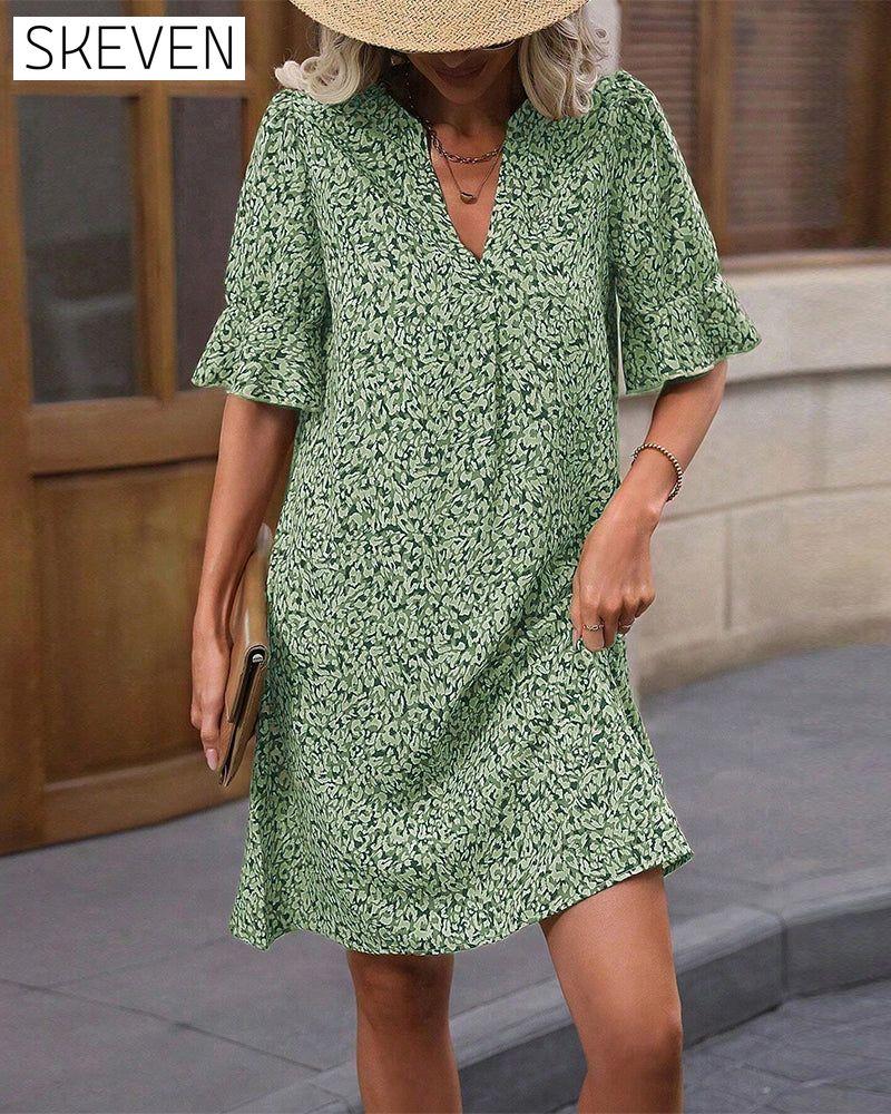 Elegantes bedrucktes Kleid mit V-Ausschnitt