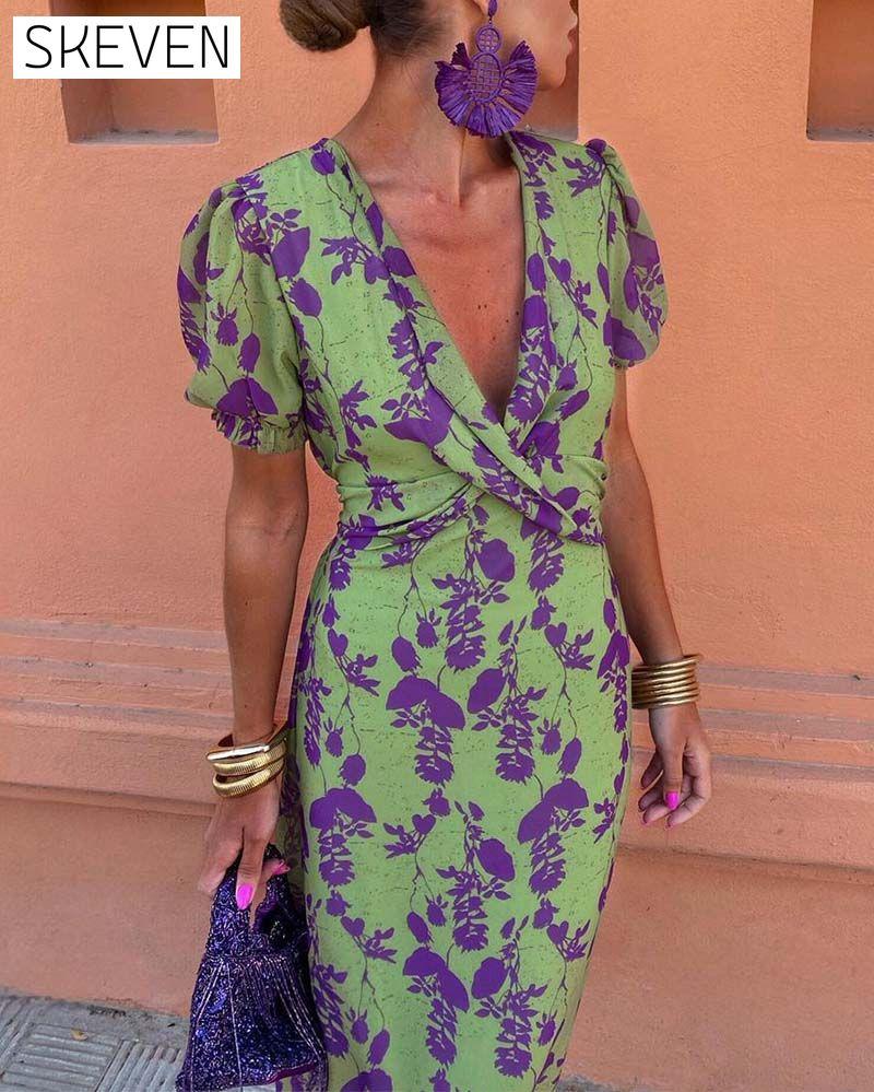 Elegantes A-Linien-Kleid mit Blätterprint, tiefem V-Ausschnitt und Puffärmeln