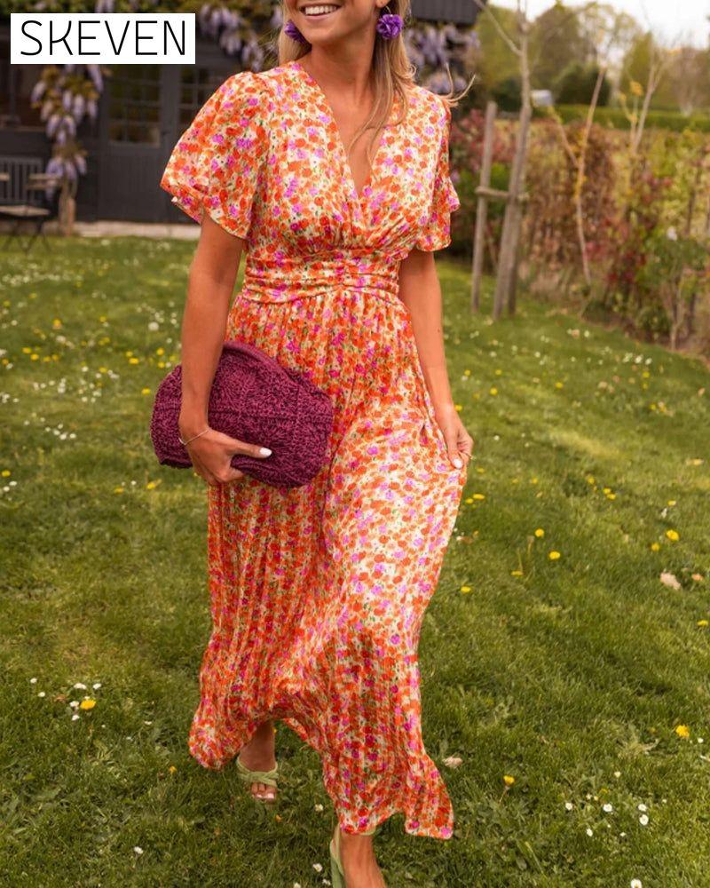 Blumenkleid mit V-Ausschnitt und Taille