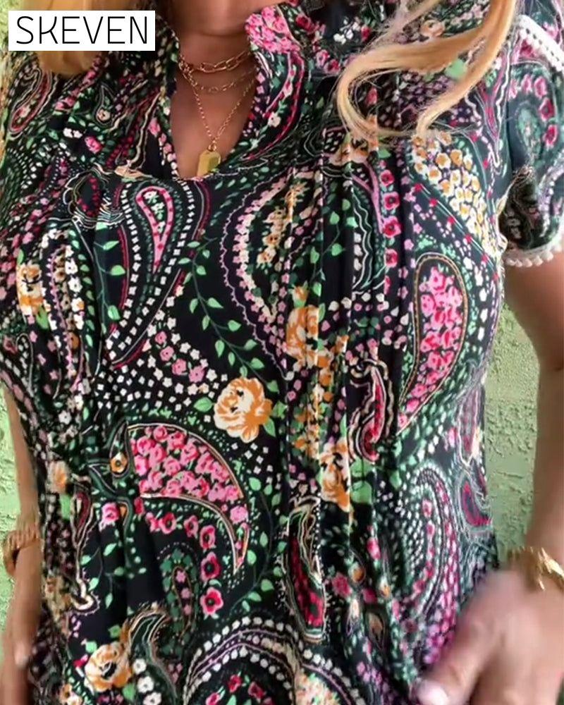 Bluse mit Blütenblattärmeln und Faltenmuster