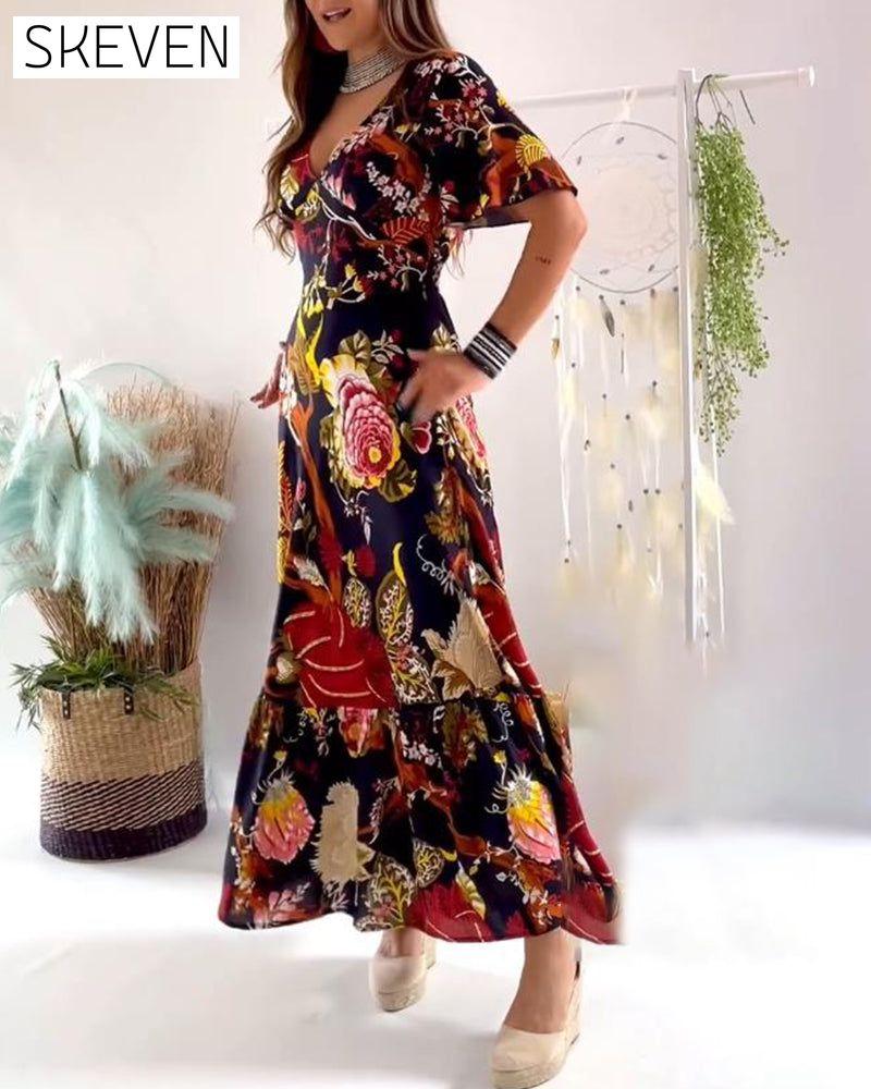 Elegantes, bedrucktes Kurzarmkleid mit V-Ausschnitt