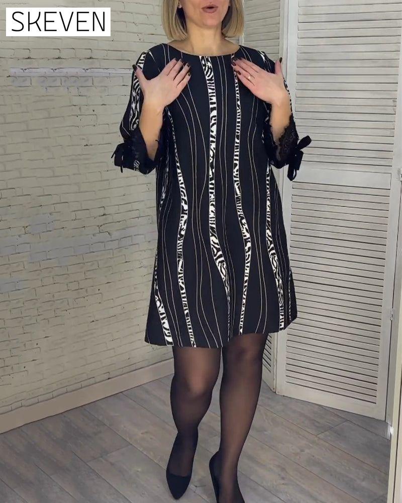 Knee-length striped dress