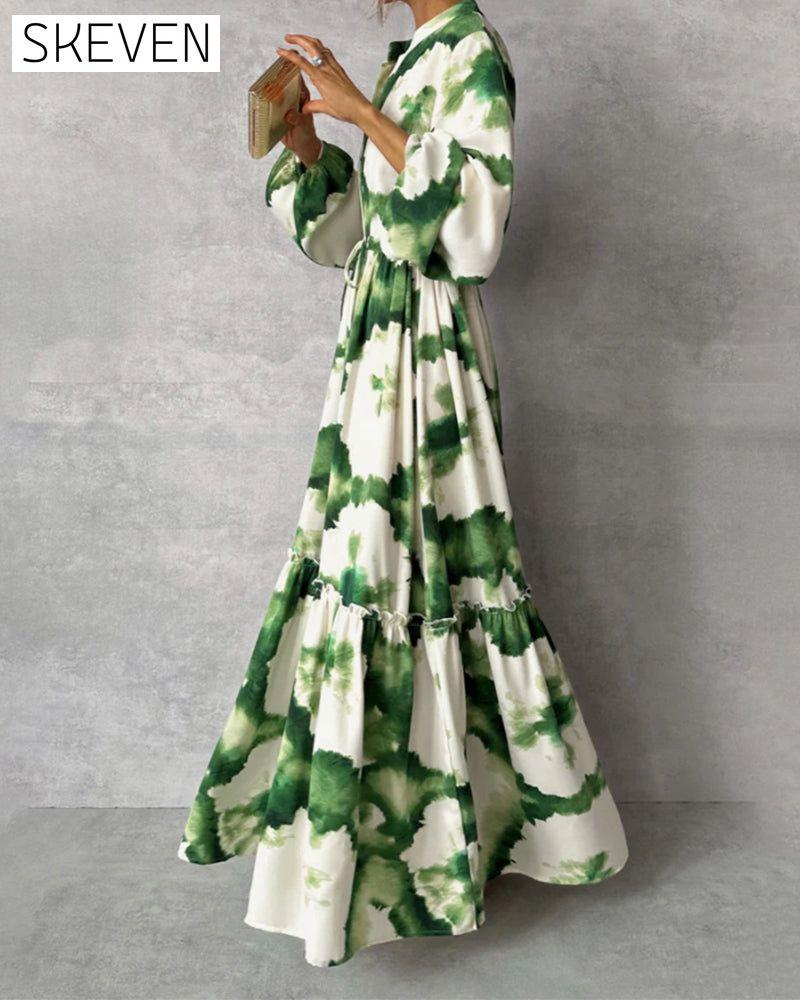 Elegantes Kleid mit Batik-Patchwork-Muster, Kordelzug und Ballonärmeln