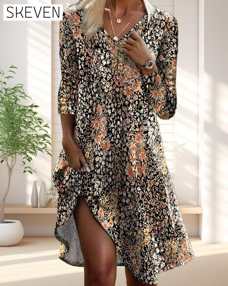 Elegantes Kleid mit langen Ärmeln und Blumenmuster