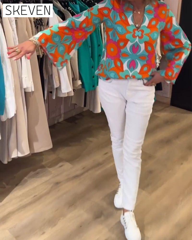 Lockere und vielseitige bedruckte Bluse